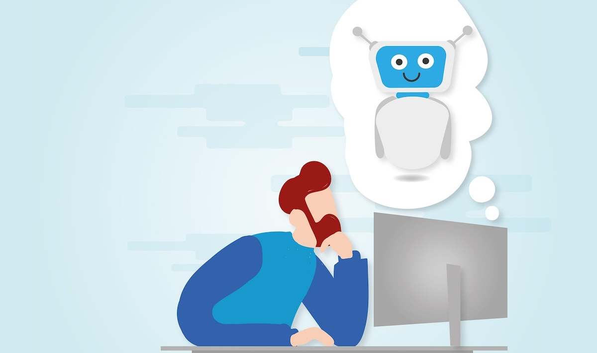 Uomo davanti al computer che riflette sull'uso dell'intelligenza artificiale — usare l'IA con consapevolezza